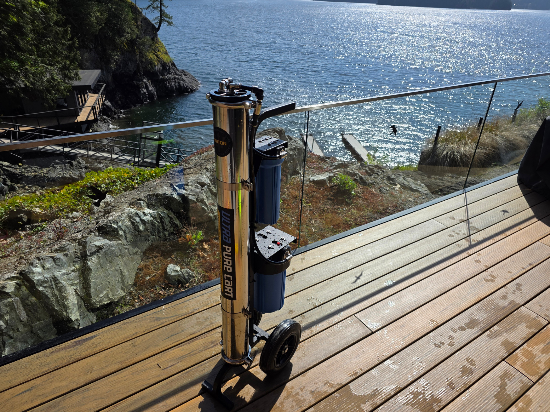 Complete Window Cleaning Ultra Pure Cart purified water system staged on a waterfront deck, ready for service